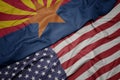 waving colorful flag of united states of america and flag of arizona state Royalty Free Stock Photo