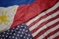 waving colorful flag of united states of america and national flag of philippines Royalty Free Stock Photo