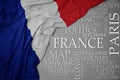 Waving colorful national flag of france on a gray background with important words about country Royalty Free Stock Photo