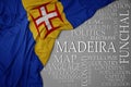 Waving colorful national flag of madeira on a gray background with important words about country