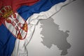 Waving colorful national flag and map of serbia. Royalty Free Stock Photo
