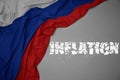 waving colorful national flag of russia on a gray background with broken text inflation. 3d illustration Royalty Free Stock Photo