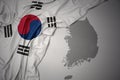 Waving colorful national flag and map of south korea.