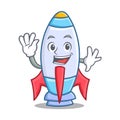 Waving cute rocket character cartoon