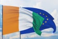 Waving European Union flag and flag of Cote Ivoire. Closeup view, 3D illustration.