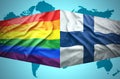 Waving Finnish and Gay flags