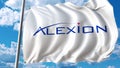 Waving flag with Alexion Pharmaceuticals logo. Editoial 3D rendering Royalty Free Stock Photo