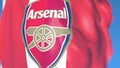 Waving flag with Arsenal football team logo, close-up. Editorial 3D rendering
