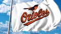 Waving flag with Baltimore Orioles professional team logo. Editorial 3D rendering Royalty Free Stock Photo