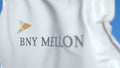 Waving flag with The Bank Of New York Mellon logo, close-up. Editorial 3D rendering