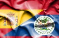 Waving flag of Belize and Spain