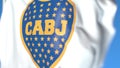 Waving flag with Boca Juniors football club logo, close-up. Editorial 3D rendering