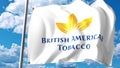 Waving flag with British American Tobacco BAT logo against clouds and sky. Editorial 3D rendering