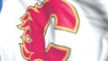 Waving flag with Calgary Flames NHL hockey team logo, close-up. Editorial 3D rendering