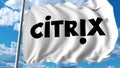 Waving flag with Citrix Systems logo. Editoial 3D rendering Royalty Free Stock Photo