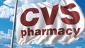 Waving flag with Cvs Pharmacy logo against sky and clouds. Editorial 3D rendering Royalty Free Stock Photo