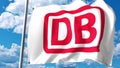 Waving flag with Deutsche Bahn DB logo against clouds and sky. Editorial 3D rendering