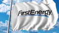 Waving flag with Firstenergy logo. Editoial 3D rendering Royalty Free Stock Photo