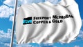Waving flag with Freeport-Mcmoran logo. Editoial 3D rendering