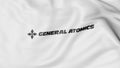 Waving flag with General Atomics logo. Editorial 3D rendering Royalty Free Stock Photo