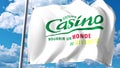 Waving flag with Groupe Casino logo against clouds and sky. Editorial 3D rendering