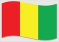 Waving flag of Guinea vector graphic. Waving Guinean flag illustration. Guinea country flag wavin in the wind is a symbol of
