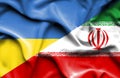 Waving flag of Iran and Ukraine