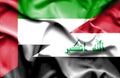 Waving flag of Iraq and United Arab Emirates