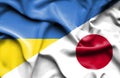 Waving flag of Japan and Ukraine
