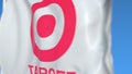 Waving flag with Target Corporation logo, close-up. Editorial 3D rendering