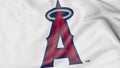 Waving flag with Los Angeles Angels of Anaheim MLB baseball team logo, 3D rendering