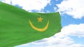 Waving flag of Mauritania on blue cloudy sky.