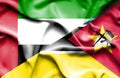 Waving flag of Mozambique and United Arab Emirates