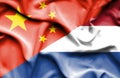 Waving flag of Netherlands and China