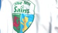 Flying flag with The New Saints football club logo, close-up. Editorial 3D rendering