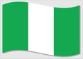 Waving flag of Nigeria vector graphic. Waving Nigerian flag illustration. Nigeria country flag wavin in the wind is a symbol of