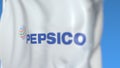 Waving flag with Pepsico logo, close-up. Editorial 3D rendering