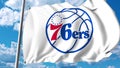 Waving flag with Philadelphia 76Ers professional team logo. Editorial 3D rendering