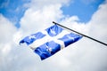 The waving flag of Quebec Royalty Free Stock Photo