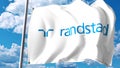Waving flag with Randstad Holding logo against clouds and sky. Editorial 3D rendering
