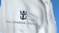 Flying flag with Royal Caribbean Cruises Ltd logo, close-up. Editorial 3D rendering