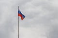 Waving flag of Russia against cloudy sky Royalty Free Stock Photo