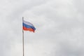 Waving flag of Russia against gloomy sky Royalty Free Stock Photo