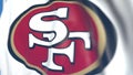 Waving flag with San Francisco 49Ers team logo, close-up. Editorial loopable 3D animation