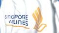 Waving flag with Singapore Airlines logo, close-up. Editorial 3D rendering