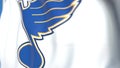 Waving flag with St. Louis Blues NHL hockey team logo, close-up. Editorial 3D rendering