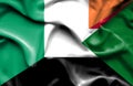 Waving flag of Sudan and Ireland
