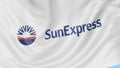 Waving flag of SunExpress against blue sky background, seamless loop. Editorial 4K animation