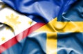 Waving flag of Sweden and Philippines