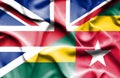 Waving flag of Togo and Great Britain